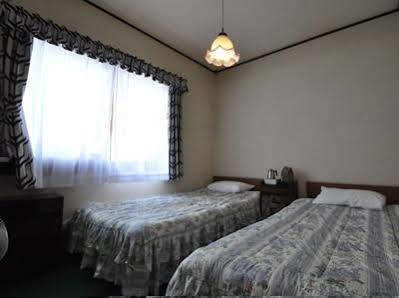 Guest House Wind Inn Hakuba Bagian luar foto